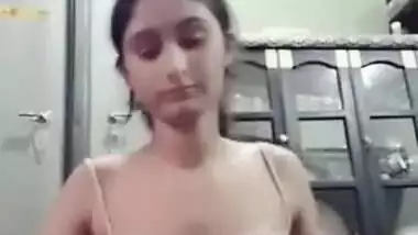 Cute girl stripping naked