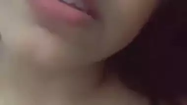 Horny girlfriend playing with her big boobs