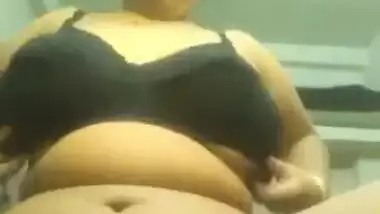 MILF showing big boobs and fingering pussy