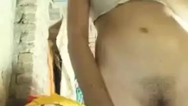 Indian aunty thinks it's a good day to put on clothes on the camera