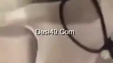 Excited nude Desi model pleases herself with intense XXX fingering