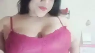 Big boob nude girl shows her butt and squeezes her boobs