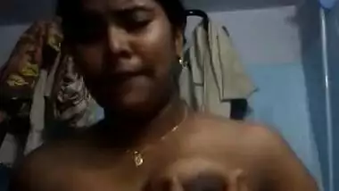 Tamil teen squeezing her boobs with hot expression