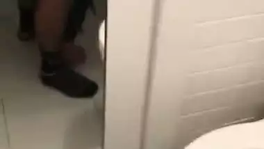Indian girl fucks in a public bathroom in NRI porn