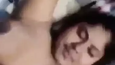 Malayalam sex video of a couple in a missionary position