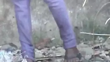 Hot village girl peeing in the open place
