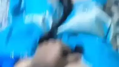 Desi chudai of Bhabhi lying on bed in blue saree