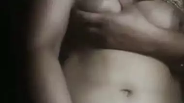 Bhabi masturbating and talking on phone