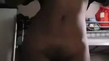 Come-hither Indian female performs XXX striptease in front of the camera