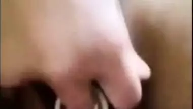 Teengirl fingering her pussy with condoms on video call