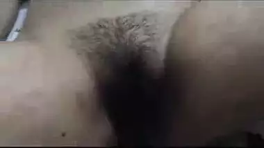 Watch this Indian sleeping beauty exposing her hairy pussy